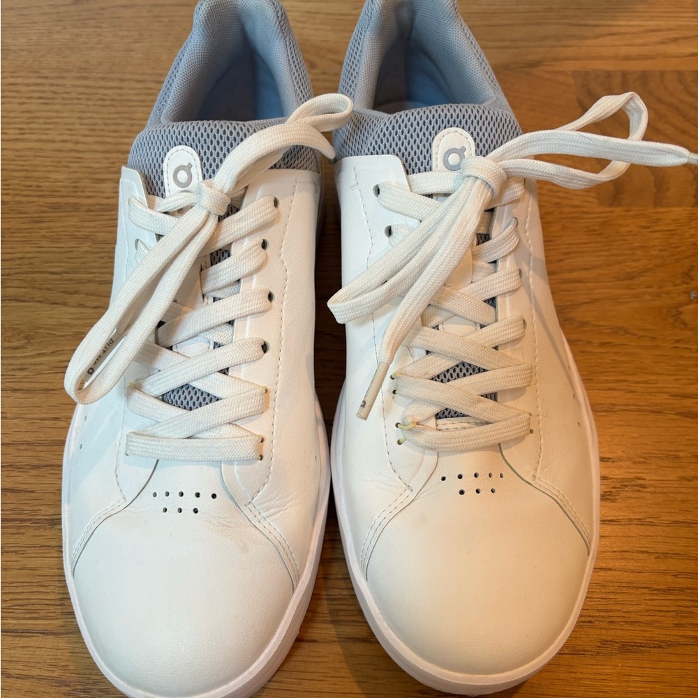 On Running White and Gray Athletic Shoes with Minimalist Design